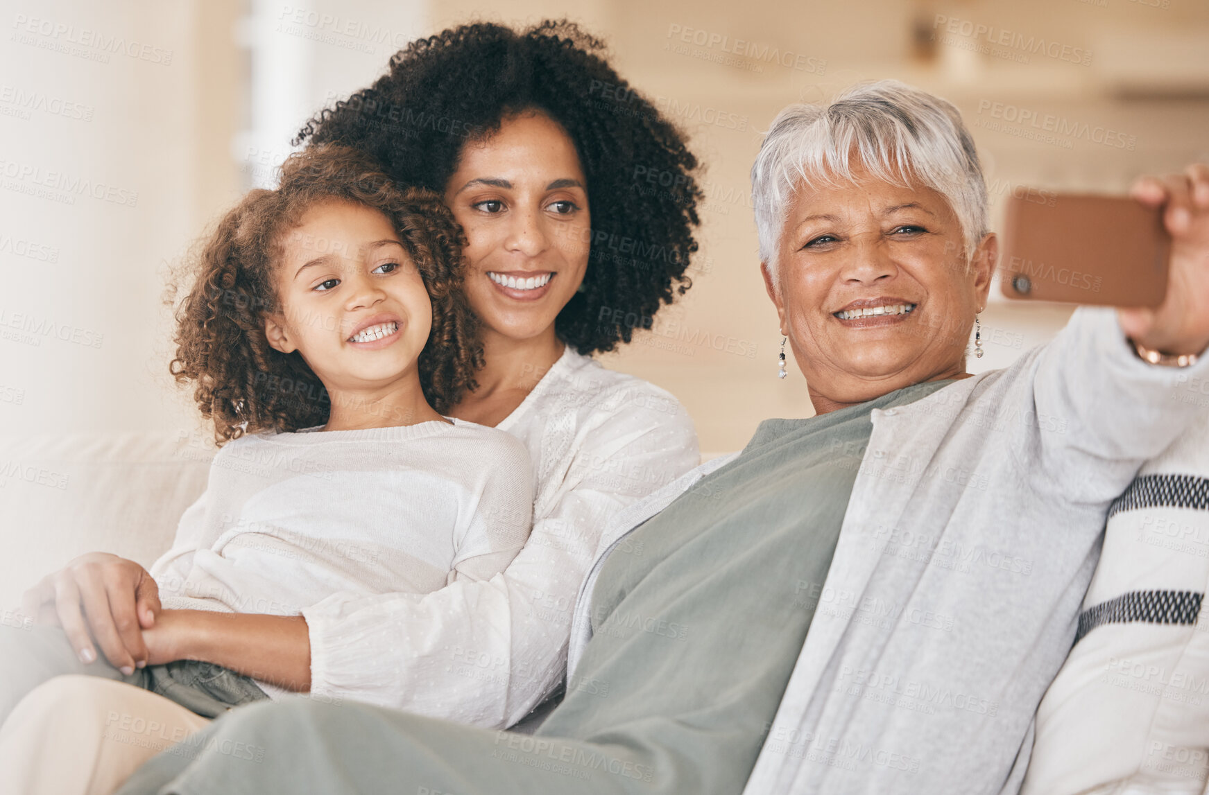 Buy stock photo Family, selfie and living room couch with a smile, grandmother and child together with mom. Bonding, sofa and happy mother with a young girl and senior woman with photo for social media post at home