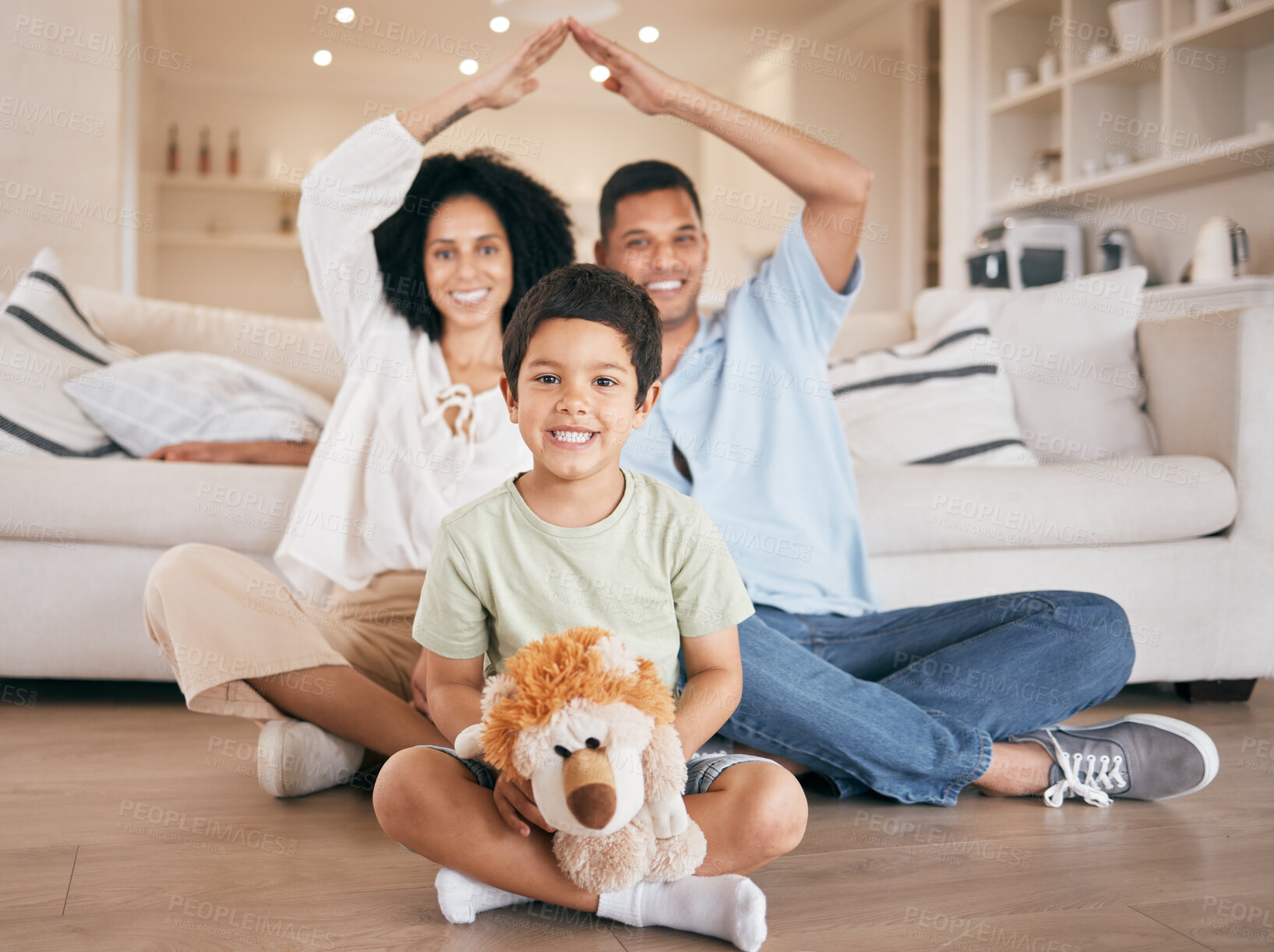 Buy stock photo Portrait, insurance or security with parents and son on the floor in the living room of their home together. Smile, real estate or property with mother, father and boy child looking happy in a house