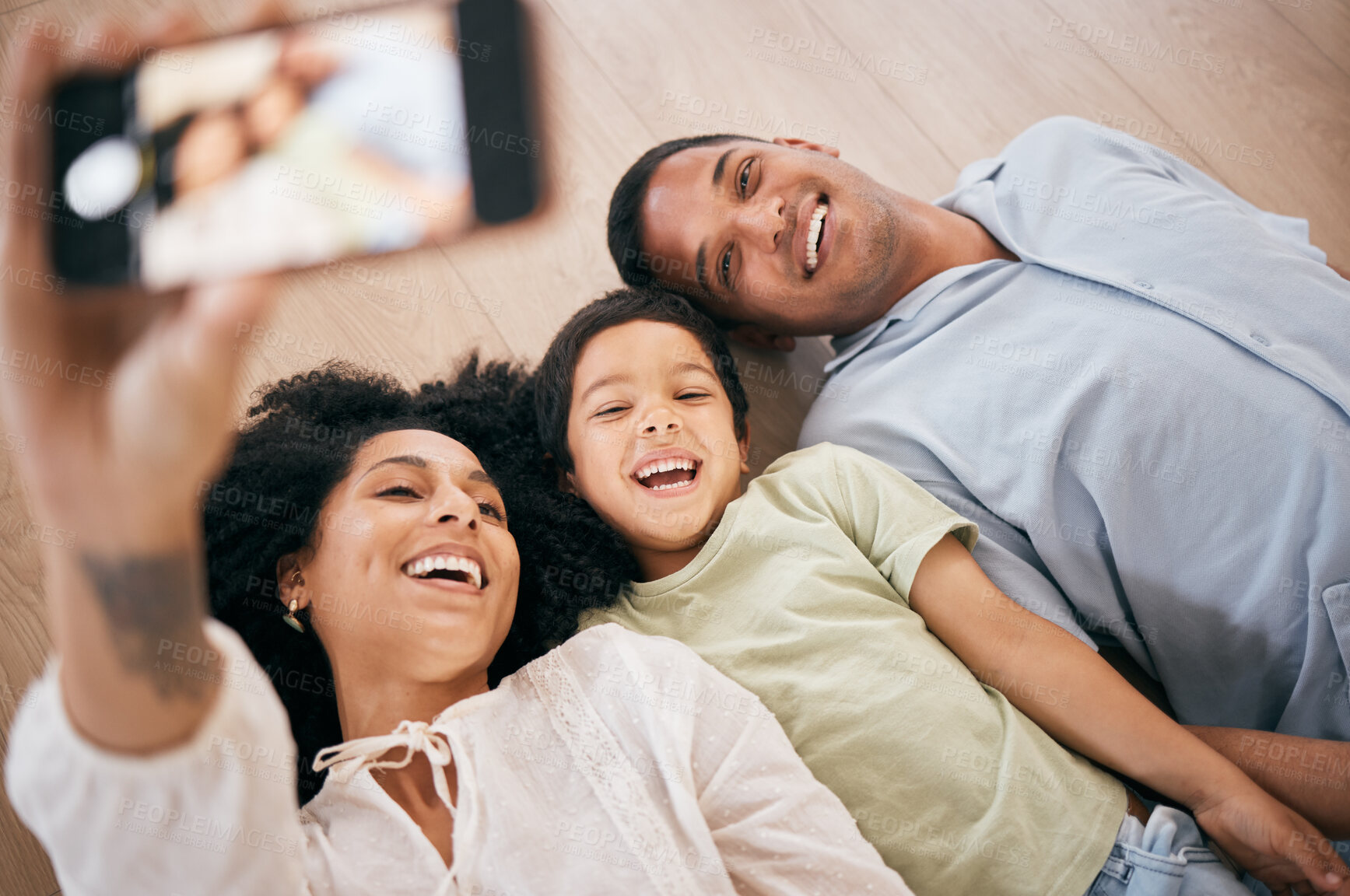 Buy stock photo Family, selfie and hand with phone, screen and profile picture of mom, child and dad together in home with social media or post. Happy, portrait and photography on cellphone with happiness and love