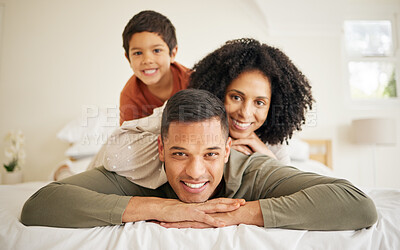 Buy stock photo Happy, family and bedroom with portrait with bonding of father, mother and child smile. Home, mom and dad together with love, bonding and care in a bed in morning with young kid in house with parents