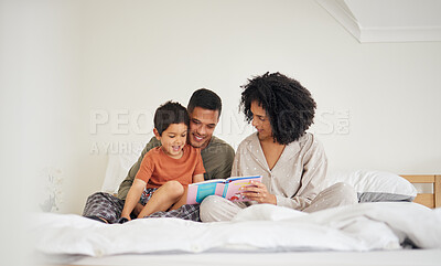 Buy stock photo Family, parents and child reading book in bed with bonding, love and education during storytelling time at home. Learning, knowledge and story, man with woman and kid in bedroom, support and help