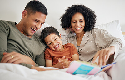 Buy stock photo Family, parents and kid reading book in bed with bonding, love and education during storytelling time at home. Learning, knowledge and story, man with woman and child in bedroom with happiness