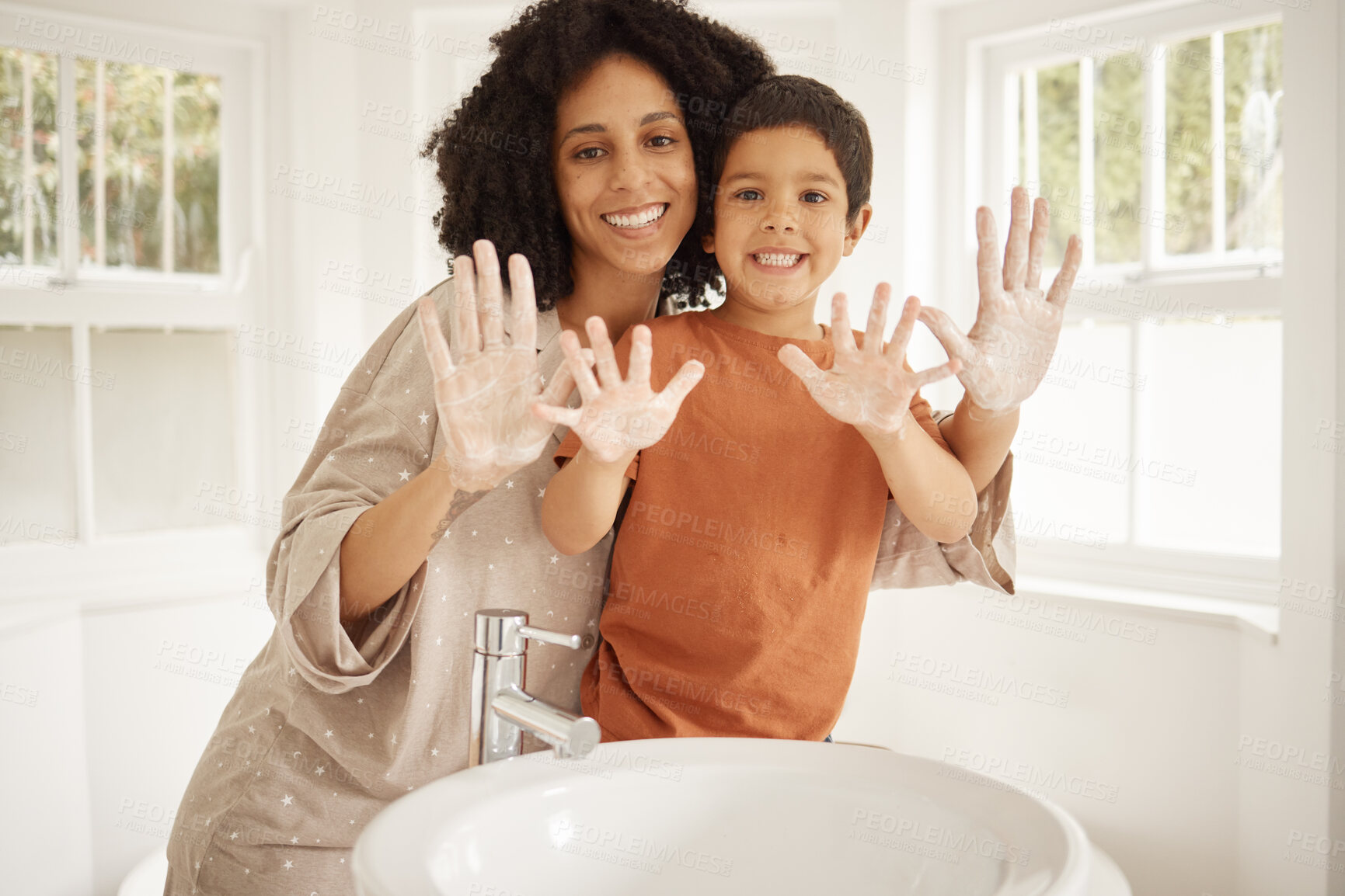 Buy stock photo Mother, child and cleaning hands, soap in bathroom with hygiene and skincare in portrait with morning routine. Foam, palm and health, woman and boy at family home, handwashing and germs with wellness