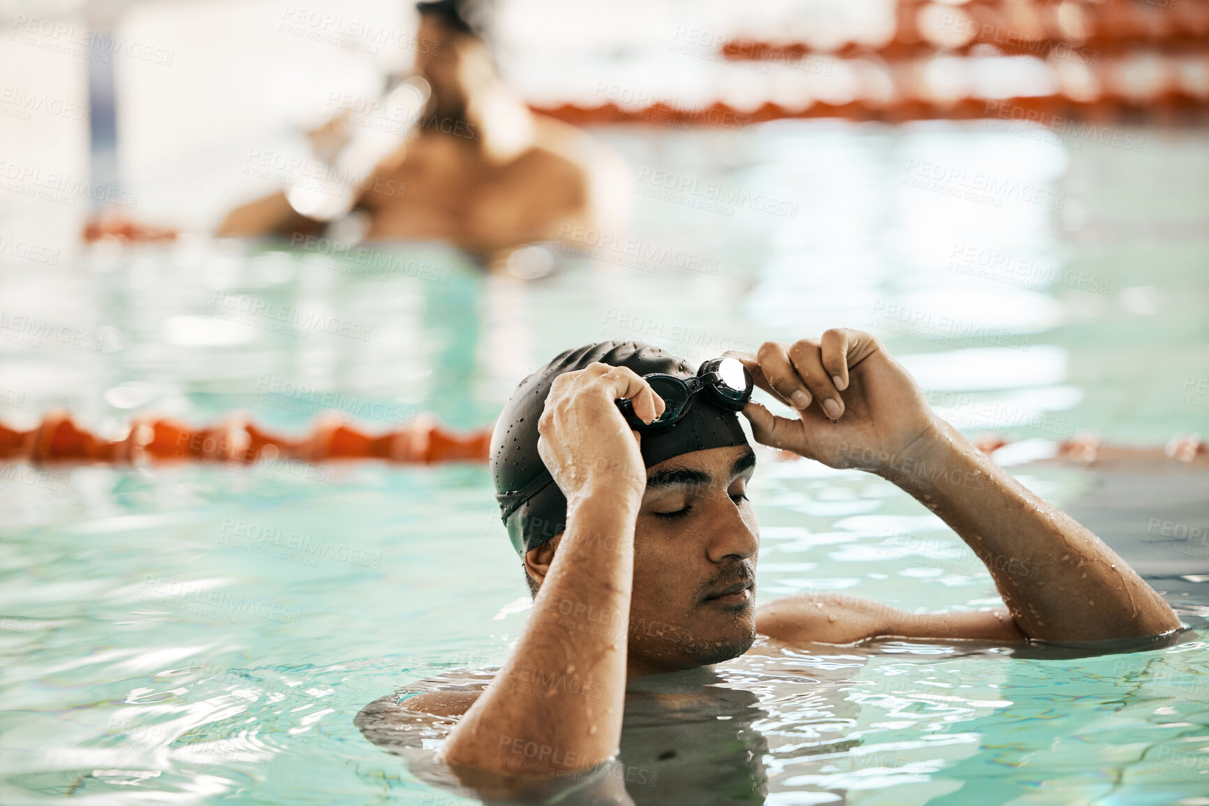 Buy stock photo Swimming pool, man and sport athlete for workout and training race in professional gym. Male person, fitness and exercise for water competition in a health and wellness club for pool and athlete