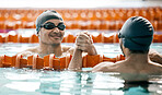 Swimming pool, friends and men celebrate winning for fitness, exercise and training together in gym. Water sports, professional swimmers and happy people for challenge, teamwork and race competition