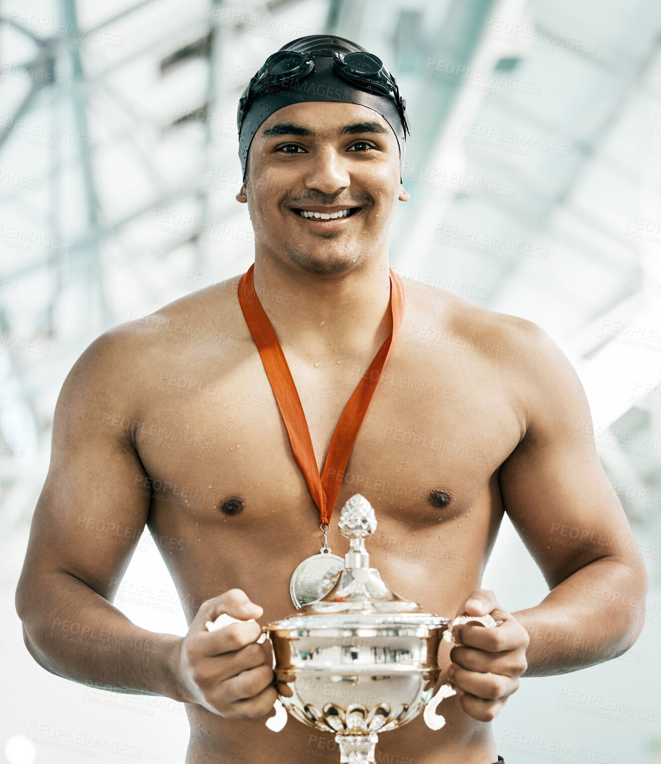 Buy stock photo Swimmer man, trophy and portrait with smile, pride and happy for success by pool, competition and challenge. Swimming athlete, champion and excited winner with celebration, goal and medal for contest