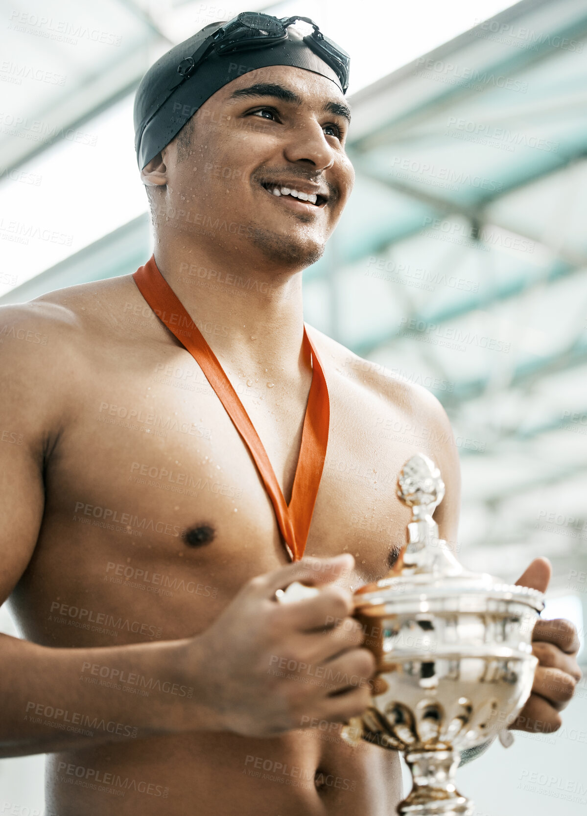 Buy stock photo Sports winner, swimming trophy and happy man with competition success, fitness achievement and winning race. Happiness, athlete and swimmer with prize, pride and champion smile at challenge event   