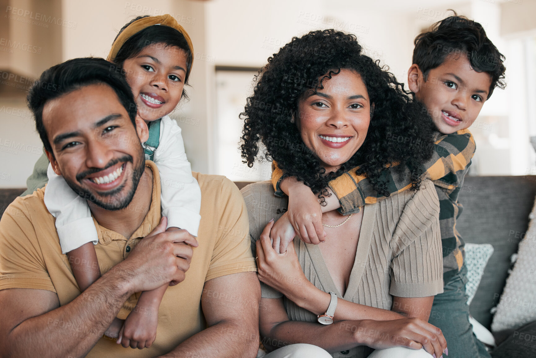 Buy stock photo Portrait of parents, kids and hug on sofa together, love and happy family fun in living room of home. Mom, dad and children embrace on couch with support, trust and smile with bonding in apartment.