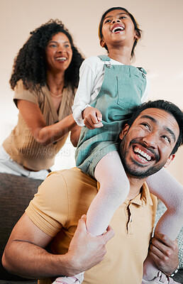 Buy stock photo Parents, kid and playing on sofa together, love and happy family fun in living room of home. Mom, dad and girl with piggy back on couch with support, trust and smile with playful bonding in apartment