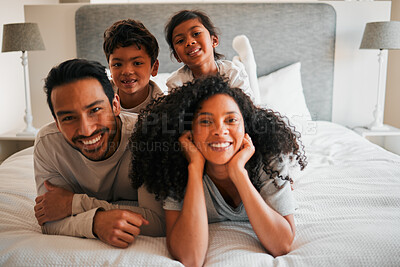 Buy stock photo Portrait, morning and happy with family in bedroom for bonding, love and support. Wake up, trust and care with parents and children relax in bed at home for funny, excited and happiness together