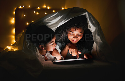 Buy stock photo Night, tablet and mother with child in tent with fairy lights for bedtime story, movies and online cartoons. Happy family, bedroom and mom and kid on digital tech for bonding, love and care in home 