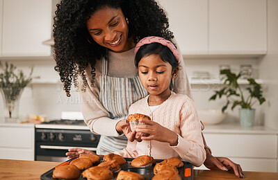 Buy stock photo Kitchen, mom and kid, cupcake baking in house and eating  together, happy with dessert in apartment. Child development, cooking sweet treats and bonding time, woman baker and girl in home with cake.