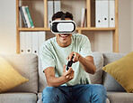 Virtual reality glasses, home and man with game, controller and metaverse with connection, smile and software. Person, gamer or guy on a couch, VR eyewear and futuristic with online playing and relax