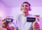 Headphones, credit card and man playing video game ecommerce for purchase with controller in virtual challenge. Internet, user experience and person or esport gamer streaming sports games online