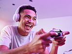 Headphones, esports and man playing video game online with controller winning virtual challenge and excited in celebration. Internet, user experience and person or gamer streaming sports games