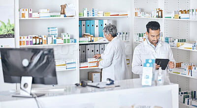 Buy stock photo Pharmacy tablet, medicine and team collaboration on healthcare inspection, quality assurance or stock inventory. Teamwork, support help and pharmacist partner cooperation on hospital clinic storage