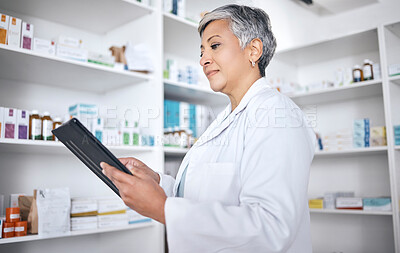 Buy stock photo Tablet, medicine pharmacist and woman research, search or reading online product description, drugs or medical stock. Clinic, mature pharmacy worker or check supplement, healthcare data or pills info