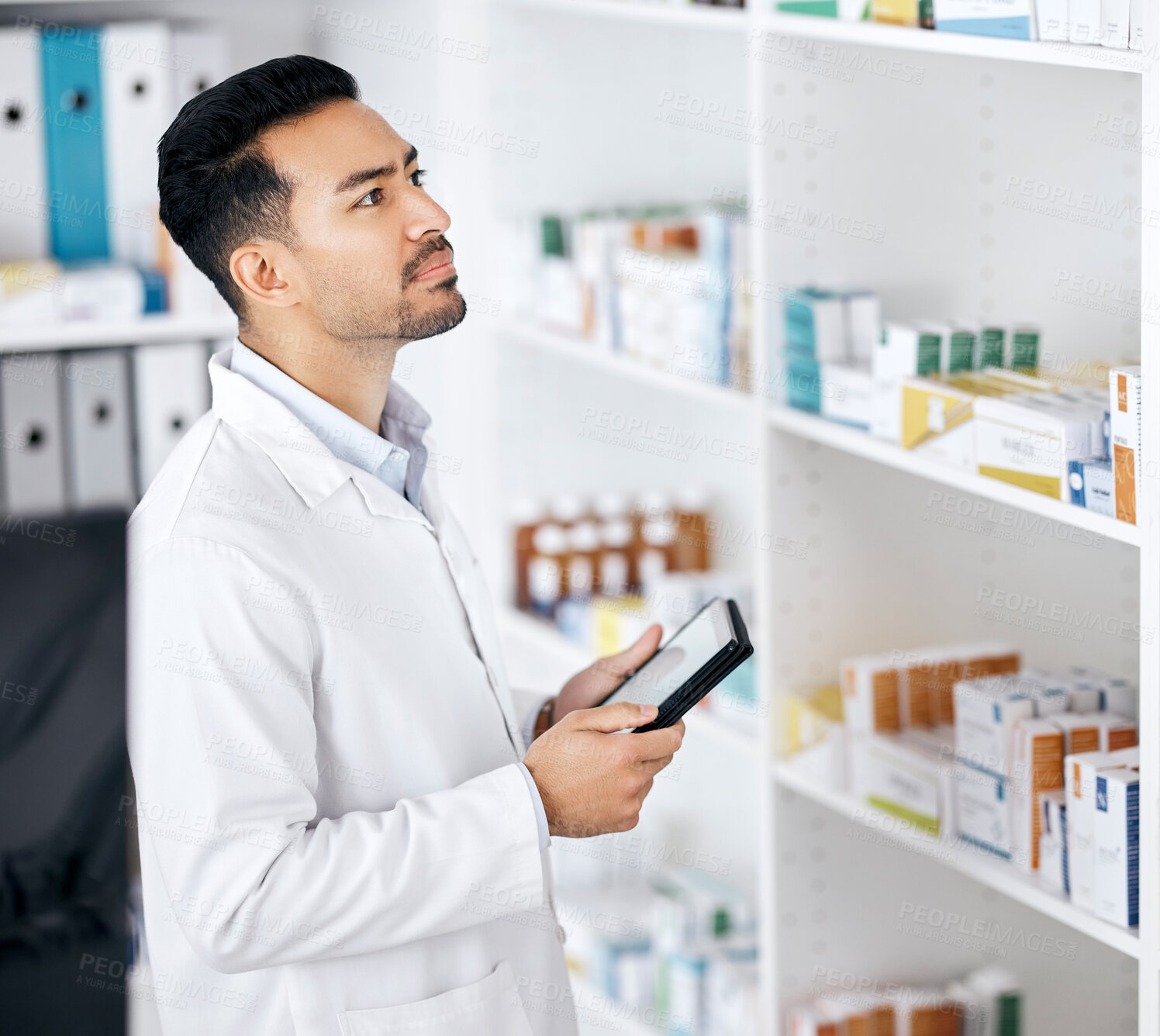 Buy stock photo Man in pharmacy with tablet, checklist and stock for medicine with online web info. Pharmacist, digital app and inventory search on internet with check for pharmaceutical drugs, tech or healthcare.