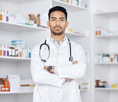 Buy stock photo Pharmacist, man and arms crossed for healthcare service, medicine inventory and store management. Professional portrait of medical worker or asian doctor in pharmacy or clinic, pills or product shelf