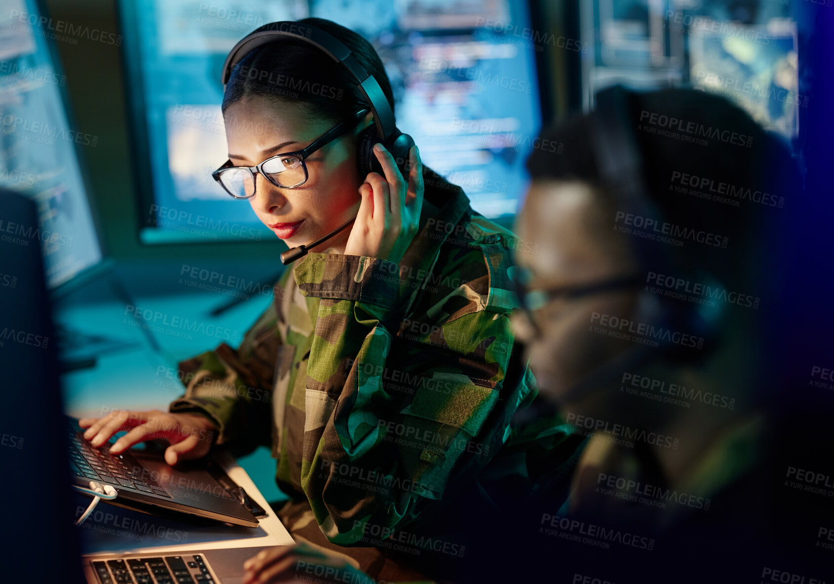 Buy stock photo Military control room, headset and woman with communication, computer and technology. Security, global surveillance and soldier with teamwork in army office at government cyber data command center.