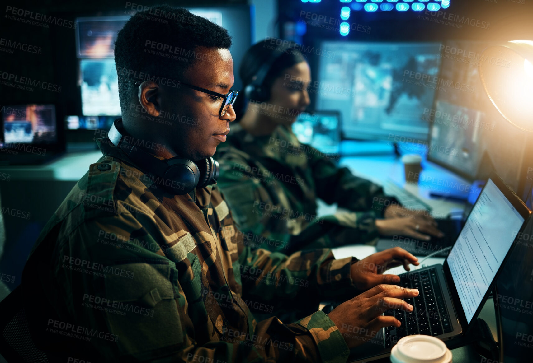 Buy stock photo Military control room, computer and soldier at desk, typing code and tech for communication army office. Security, global surveillance and black man at laptop in government cyber data command center.