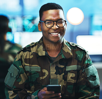 Buy stock photo Portrait, phone and a military black man in a control room for surveillance, communication or networking. Face, smile and a confident young army soldier using a mobile while in a camouflage uniform