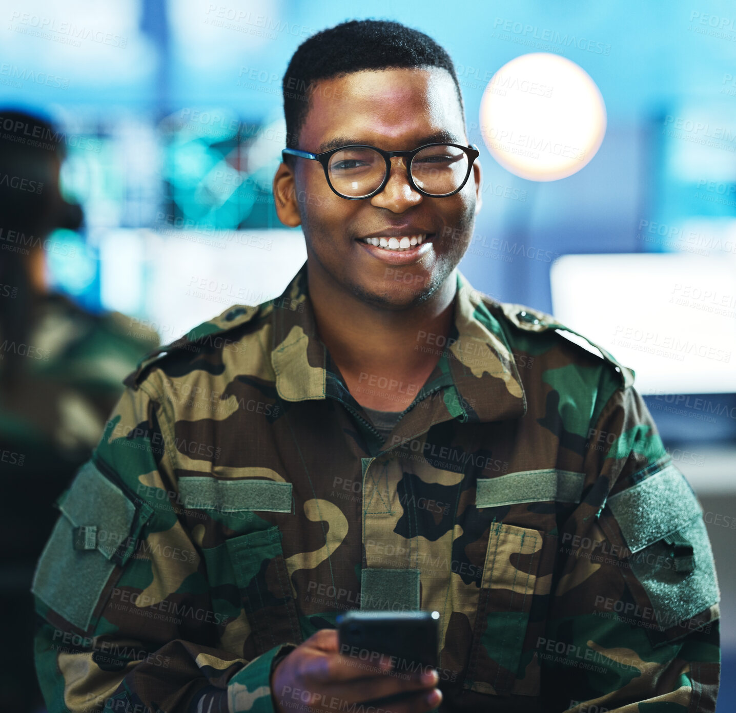 Buy stock photo Portrait, phone and a military black man in a control room for surveillance, communication or networking. Face, smile and a confident young army soldier using a mobile while in a camouflage uniform