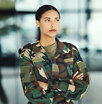 Military, thinking and arms crossed with a woman soldier in uniform for safety, service or patriotism Army, idea and a serious young war hero looking confident or ready for battle in camouflage