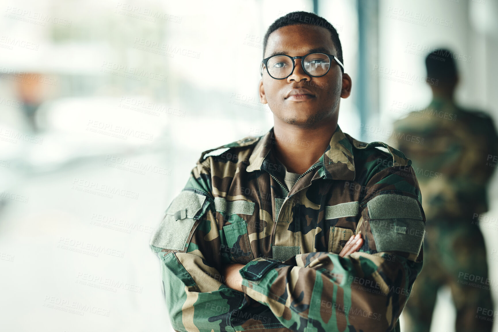 Buy stock photo Confident soldier portrait, mockup and arms crossed in army building, pride and professional hero service. Military career, security and courage, black man in camouflage uniform at government agency.