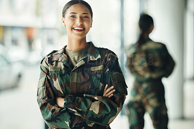 Buy stock photo Portrait, soldier and woman with arms crossed, military and security with a smile, confident and power. Face, person and warrior with pride, camouflage and protection with training, happy and war