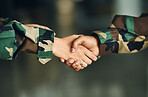 Meeting, army or shaking hands for partnership, teamwork or deal in war, agreement or unity together. Closeup, soldiers or handshake for team fight, thank you or gratitude in solidarity or military