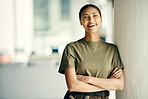 Portrait of happy woman soldier with confidence, pride and mockup outside army building with arms crossed. Professional military career, security and courage, girl in uniform at government agency.