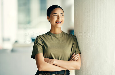 Buy stock photo Woman soldier with smile, confidence and pride, relax outside army barracks with arms crossed. Professional military career, security and courage, girl in uniform and happy government agency service.