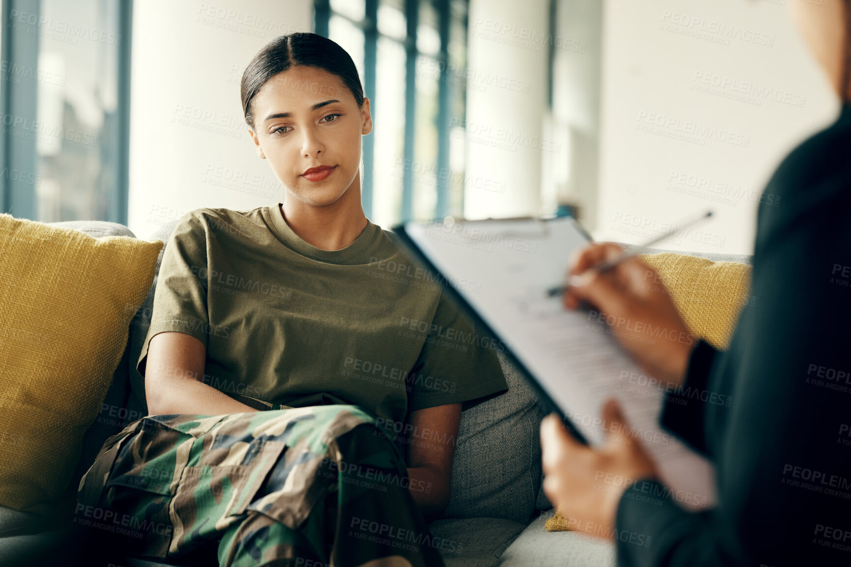 Buy stock photo Talking, soldier or sad woman in therapy for trauma counselling from military war for army mental health support. PTSD, stress or depressed person with therapist to help a psychology problem on sofa