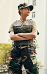 Army, thinking and arms crossed with a confident woman in uniform for safety, service or patriotism Military, idea and a serious young war soldier looking confident or ready for battle in camouflage