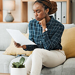 Planning, budget or black woman reading paperwork, bank document and investment report in home. Savings, insurance documents or African lady with loan information for financial future in living room