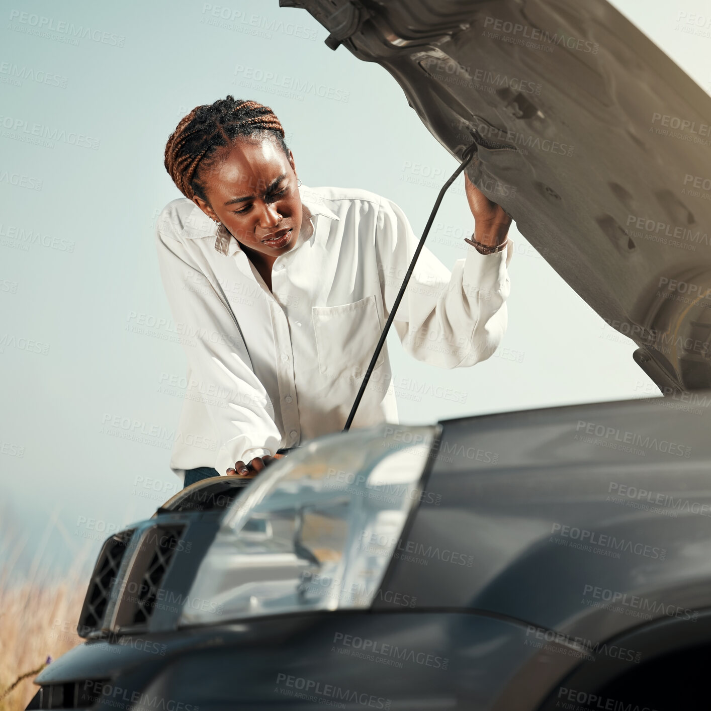 Buy stock photo Confused, broken car and black woman in the road with stress for engine problem or emergency. Transportation, travel and upset young African female person by bonnet for motor accident in the street.