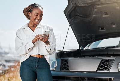 Buy stock photo Car insurance, phone or happy woman in city with an engine crisis on road typing a message for help. Online, mobile app or African driver by a stuck motor vehicle with smile texting on social media