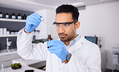 Buy stock photo Scientist, man and bottle, pipette and chemical solution with medical research, investigation and goggles for safety. Chemistry, liquid and science in laboratory, future and biotechnology with study