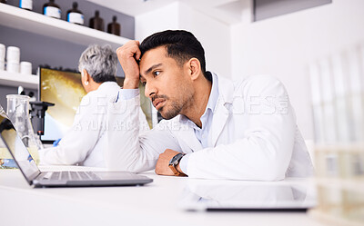 Buy stock photo Scientist, stress and headache for computer research, planning and data analysis, mistake or healthcare results. Sad or tired science man or doctor working on laptop in medical or medicine laboratory