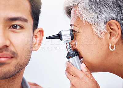 Buy stock photo Hearing test, doctor and patient with healthcare consultation  closeup, face and ENT specialist with otoscope. Medical professional, assessment and trust with man and senior woman with ear check