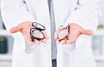 Hands, glasses choice and optometry, vision and person at eye care clinic, doctor with help or advice. Frame, prescription lens and decision for optometrist healthcare, medical and cosmetic closeup