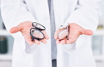 Buy stock photo Hands, glasses choice and optometry, vision and person at eye care clinic, doctor with help or advice. Frame, prescription lens and decision for optometrist healthcare, medical and cosmetic closeup