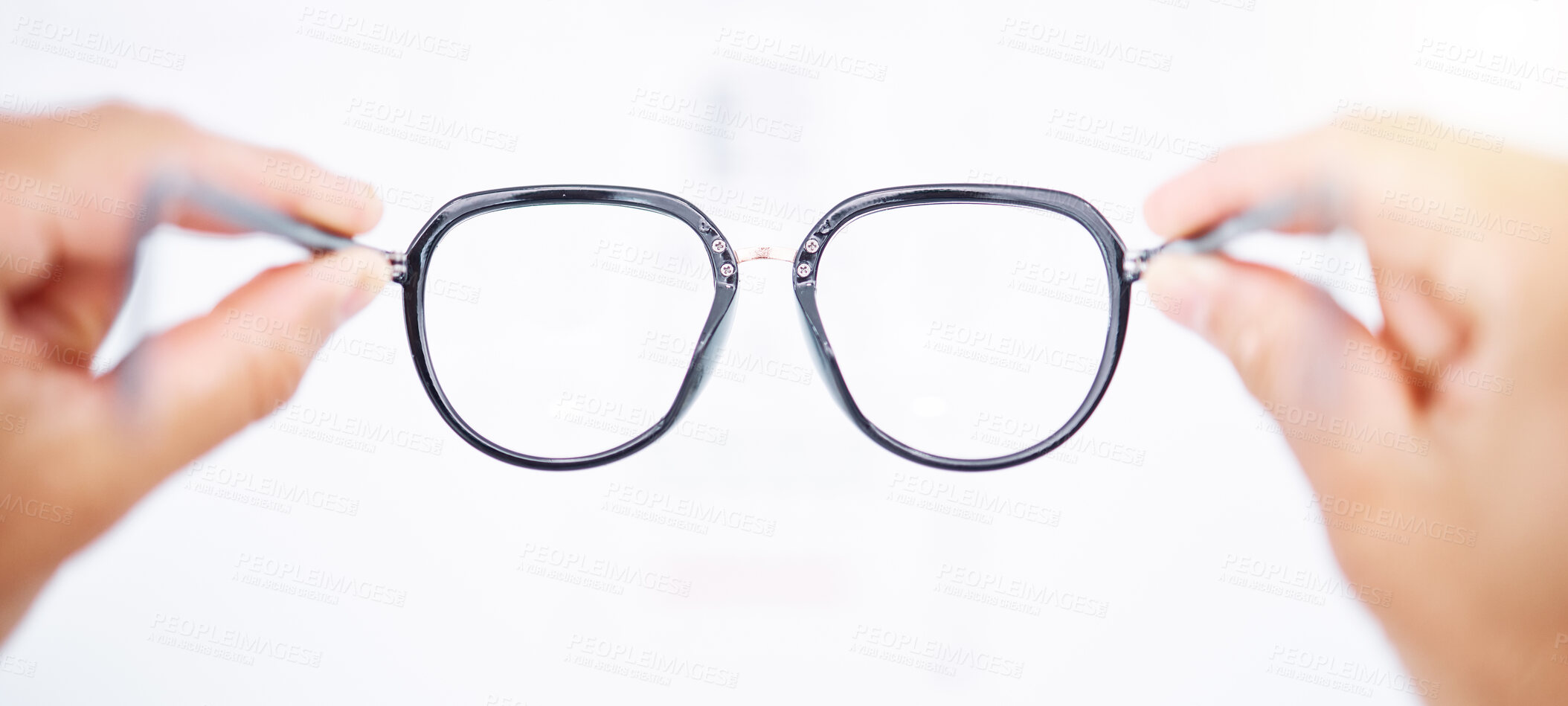 Buy stock photo Glasses in hands, frame and vision for eye care, health and person for eyesight improvement, lens and perspective. Closeup, spectacles and optometry, designer eyewear and wellness on white background