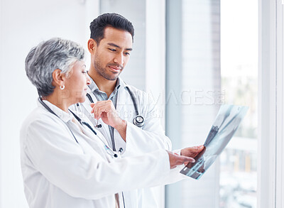 Buy stock photo Window, doctors and speaking with scan, healthcare and neurosurgeon with coaching, x ray and medical. People, mentor and employee with teamwork, planning or communication with support and helping