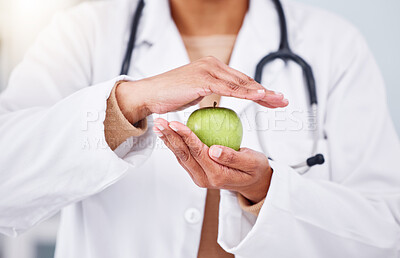 Buy stock photo Hands, apple and doctor, health and diet with nutritionist person, healthy food closeup and lose weight. Dietician, healthcare and wellness, green fruit and clean eating with vegan, organic and fiber