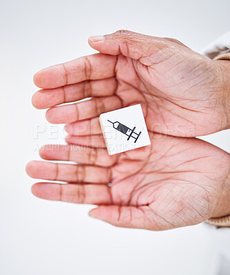 Buy stock photo Healthcare, wooden block and hands with injection sign for medical service, care and safety on white background. Hospital, symbol and person from top view for insurance, support and medicine