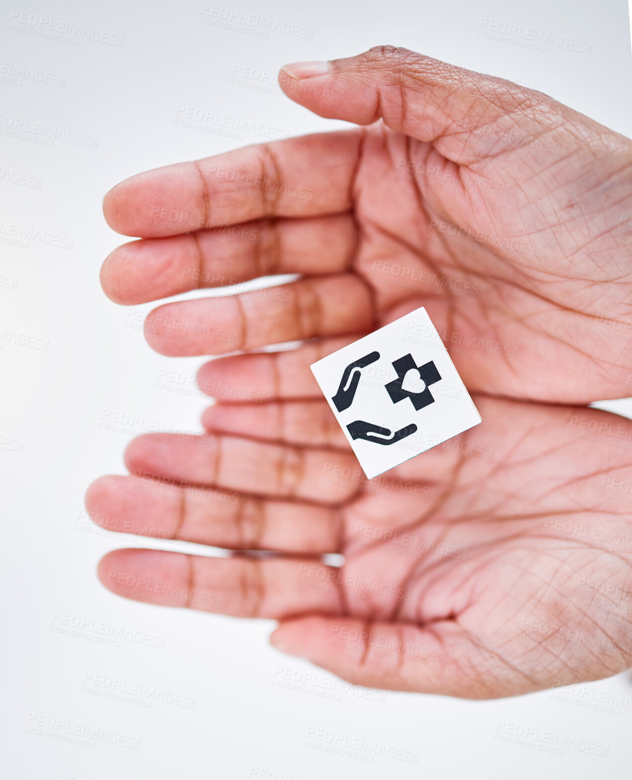 Buy stock photo Healthcare, insurance and hands with sign for medical service, care and safety on white background. Top view, symbol and person with emoji, shape and icon for help, support and medicine for hospital