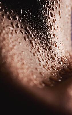 Buy stock photo Skin, water drops and closeup of a person for dermatology, skincare and hygiene. Zoom on aesthetic model for art deco, human and wet or sweat on body with droplets, creative and wellness background