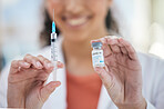 Hands, needle and vaccine bottle with person in healthcare, safe from covid with closeup, medicine and treatment. Health, syringe and immunity from virus, pharmaceutical and injection for protection 